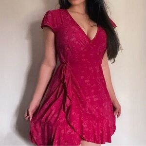 Raspberry floral wrap dress